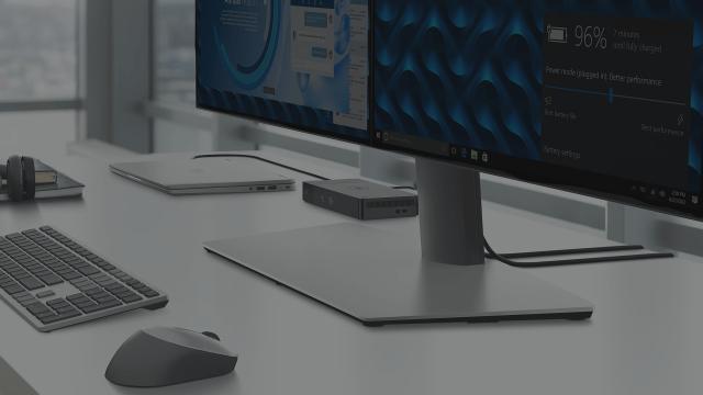 Arbejdsplads med pos udstyr som er forbundet via en Dell dock